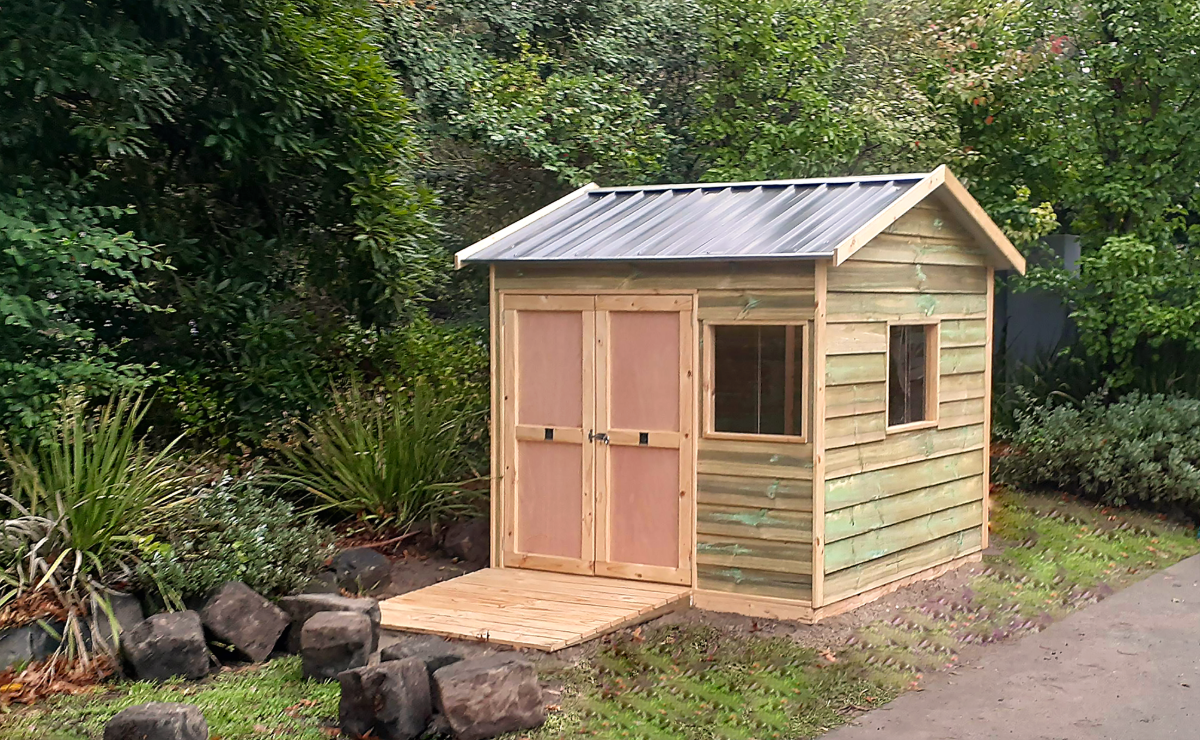 Image of Small wooden shed with pitched roof